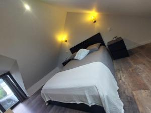 Postel nebo postele na pokoji v ubytování Gite Ker Belle Ile