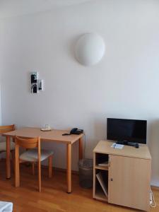 TV a/nebo společenská místnost v ubytování Centrum Mariapoli