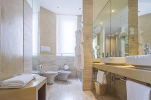 Koupelna v ubytování Hotel Excelsior