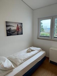 Ένα ή περισσότερα κρεβάτια σε δωμάτιο στο Ferienhaus 926