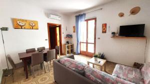 TV a/nebo společenská místnost v ubytování Residence Orsa Minore
