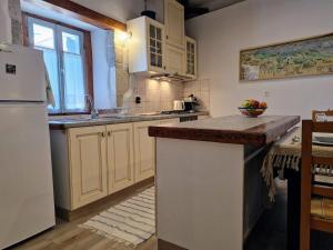 Kuchyň nebo kuchyňský kout v ubytování Zafiri House 2 BR Ocean View