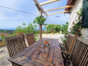 Balkón nebo terasa v ubytování Zafiri House 2 BR Ocean View + 2 fotografie