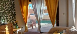 Posteľ alebo postele v izbe v ubytovaní Tirreno Vacances + 37 fotografií