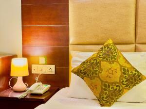 Letto o letti in una camera di The Bunkk Inn Hotel & Restaurant