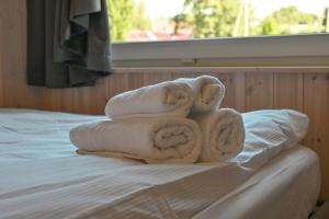 Postel nebo postele na pokoji v ubytování Kintų Perlas Vila dviems IV