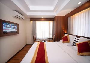 Letto o letti in una camera di Hotel Friends Home