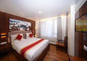 Letto o letti in una camera di Hotel Friends Home