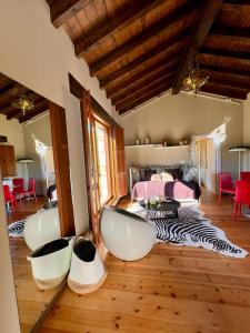 a room with three white tubs on the floor at LA CASUCA in Silió