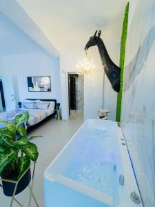 ADAMAS apartment , rooms and suite客房内的一张或多张床位