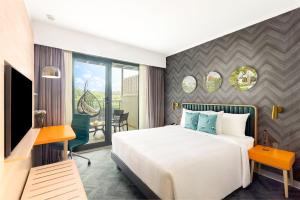 Voodi või voodid majutusasutuse ibis Styles Mysuru toas