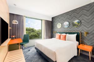 Voodi või voodid majutusasutuse ibis Styles Mysuru toas