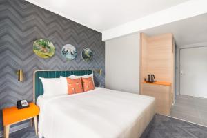 Voodi või voodid majutusasutuse ibis Styles Mysuru toas