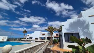 a view of a house with a swimming pool at VILLA SISSI Atlantic View in Costa Del Silencio