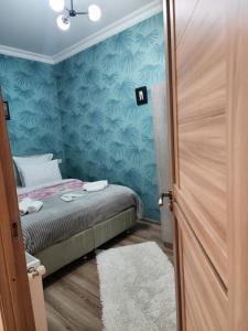 Postel nebo postele na pokoji v ubytování Hotel bereka