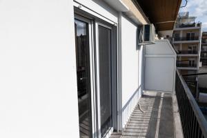 En balkon eller terrasse på Comfortable Suites 1