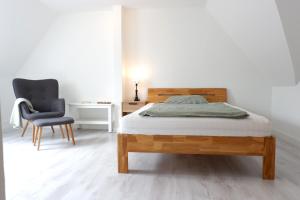 Postel nebo postele na pokoji v ubytování Landloft Nedderby