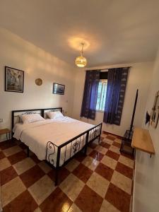 Postel nebo postele na pokoji v ubytování Hotel Al Manar