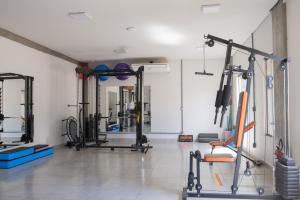 a gym with several treadmills and machines at The Garden in Bonito