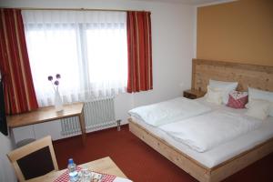 Postel nebo postele na pokoji v ubytování Landhaus Seehof