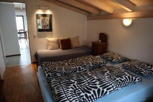 Voodi või voodid majutusasutuse Bright studio with panoramic view of Valle Verzasc toas