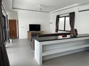 Et tv og/eller underholdning på Villa thai palm