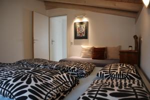 Voodi või voodid majutusasutuse Bright studio with panoramic view of Valle Verzasc toas