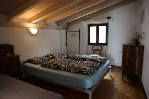 Voodi või voodid majutusasutuse Bright studio with panoramic view of Valle Verzasc toas