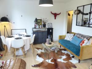 Predel za sedenje v nastanitvi PROCE - Apt lumineux et cosy, vue parc de Procé