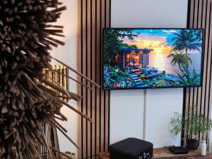 TV a/nebo společenská místnost v ubytování Boho Nest