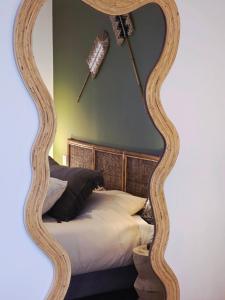 Postel nebo postele na pokoji v ubytování Boho Nest