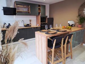 Kuchyň nebo kuchyňský kout v ubytování Boho Nest