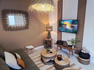 TV a/nebo společenská místnost v ubytování Boho Nest