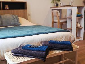 Postel nebo postele na pokoji v ubytování Boho Nest