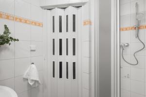 Koupelna v ubytování Enjoy Downtown Boutique Apartments #12 by Goodnite cz
