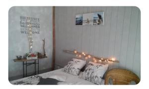 Postel nebo postele na pokoji v ubytování Jolie chambre indépendante