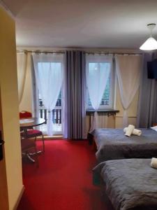 Posteľ alebo postele v izbe v ubytovaní MADOHORA_SŁOŃCE + 28 fotografií