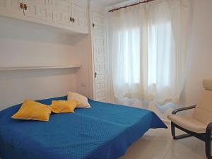 En eller flere senge i et værelse på Brisas del mar