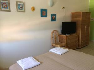 TV o dispositivi per l'intrattenimento presso Hotel Il Triangolo