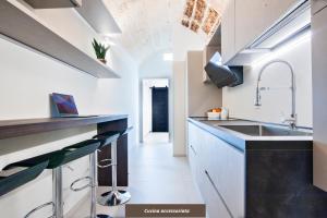 Kuchyň nebo kuchyňský kout v ubytování Chapeau Apartment - Lecce Selection