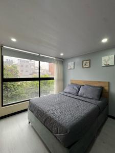 Postel nebo postele na pokoji v ubytování Hostelfc Loft 60