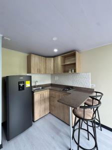 Kuchyň nebo kuchyňský kout v ubytování Hostelfc Loft 60