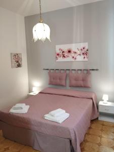 Postel nebo postele na pokoji v ubytování Armonia