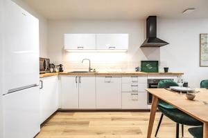 Kuchyň nebo kuchyňský kout v ubytování La Suite rue Noël + 17 fotografií