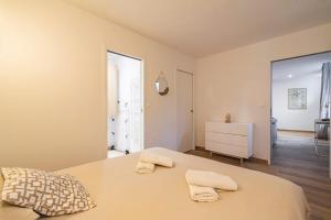 Postel nebo postele na pokoji v ubytování La Suite rue Noël