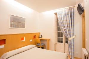 Posteľ alebo postele v izbe v ubytovaní Casa Celsa-Barbantes