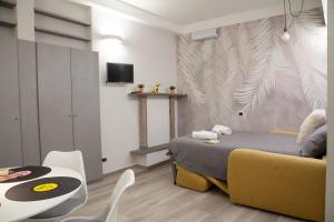 TV a/nebo společenská místnost v ubytování RRRapido Home in Brera - Via Mercato