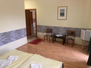 Posedenie v ubytovaní Bazilika Vendégház + 14 fotografií