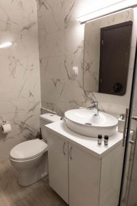 Koupelna v ubytování Comfortable Suites 2