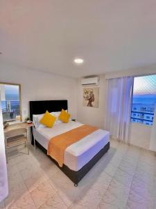 Postel nebo postele na pokoji v ubytování Apartamento hermoso en cartagena el laguito bocagrande con vista al mar